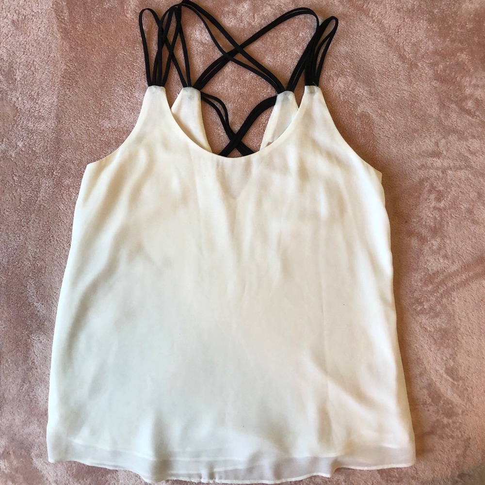 White blouse with detailed straps